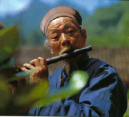 Taoist playing the flute